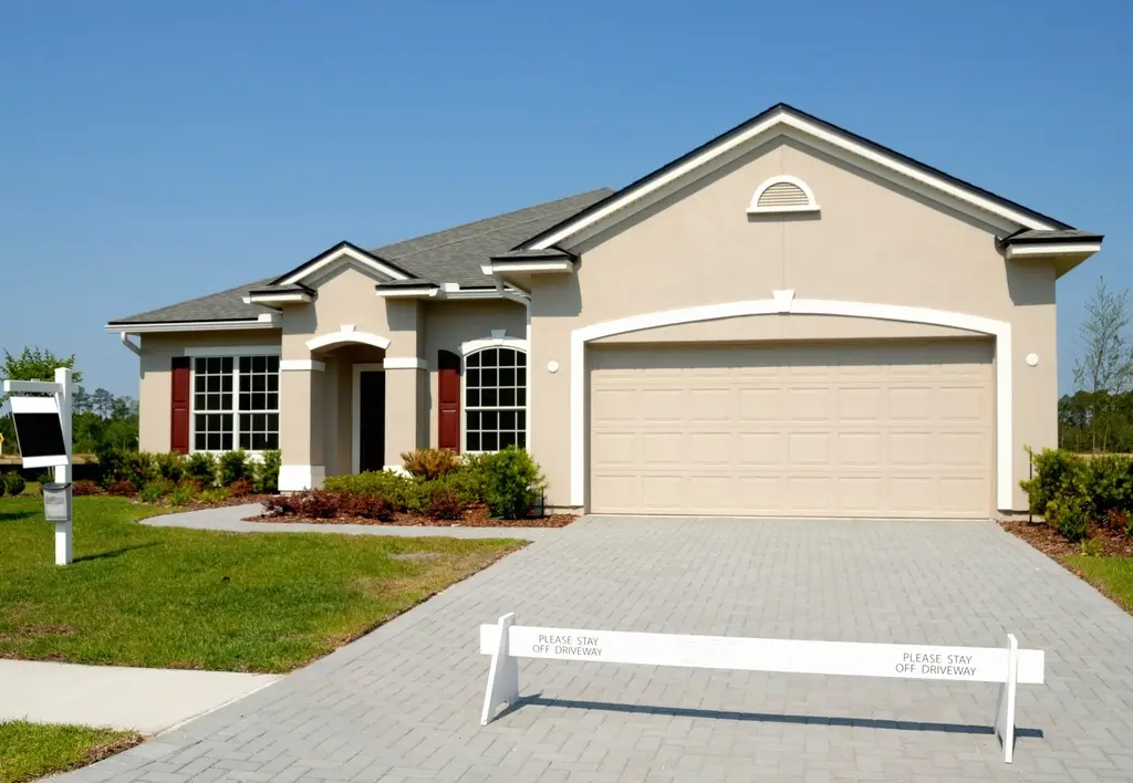 Single-story stucco home with a two-car garage