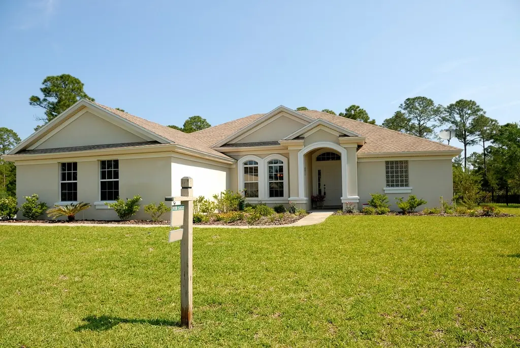 Single-story home with a wide front lawn