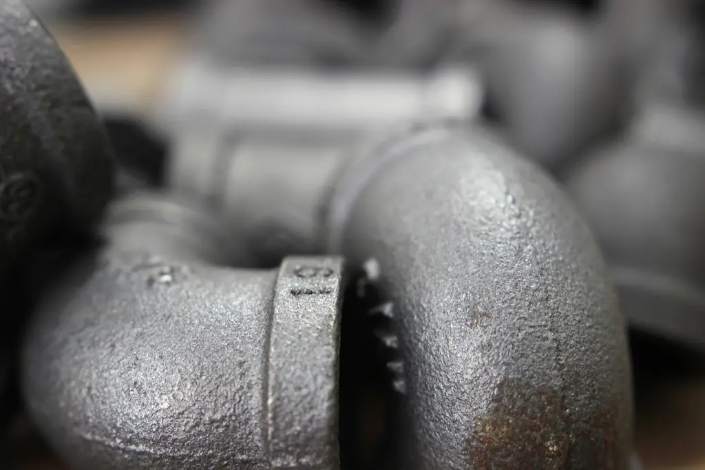 Close-up of metal threaded pipe fittings